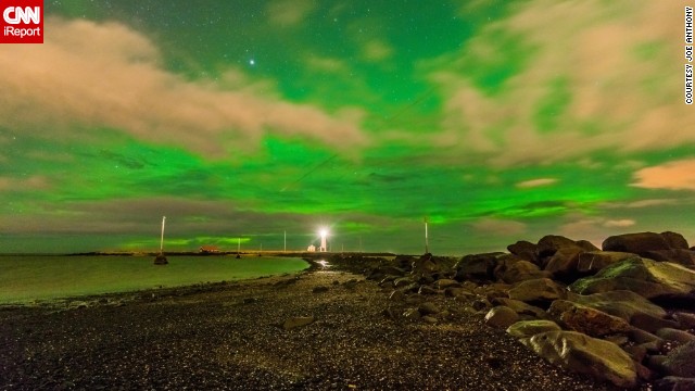 Follow this meteor trail through a glowing sky over a lighthouse in Reykjavik, Iceland. See more photos on <a href='http://ift.tt/1hSIdlL'>CNN iReport</a>. 