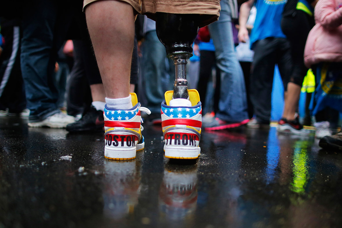 The shoes of 2013 Boston Marathon bombing survivor JP Norden read 