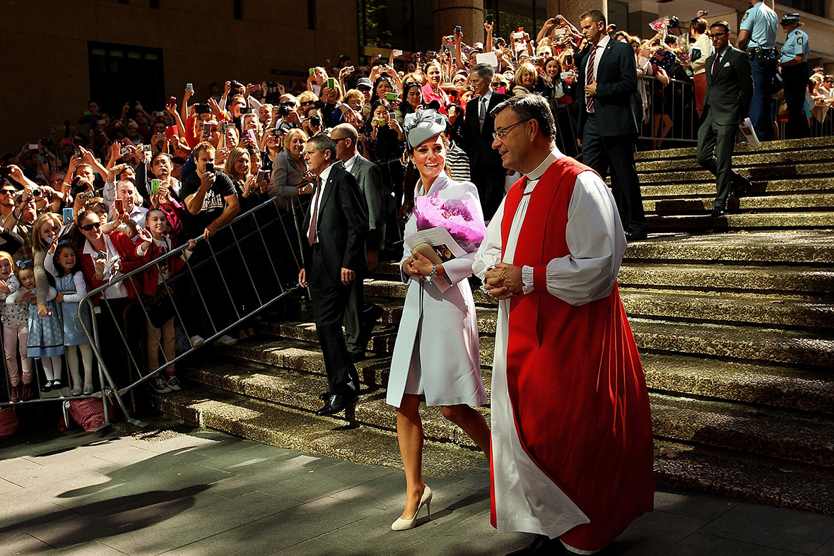 Kate Middleton is escorted by Archbishop of Sydney Glenn Davies following an Easter Sunday service at St. Andrews Cathedral in Sydney