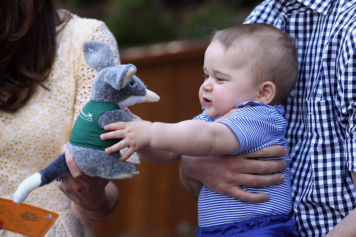 Prince George holds a toy bilby during a visit to Taronga Zoo in Sydney