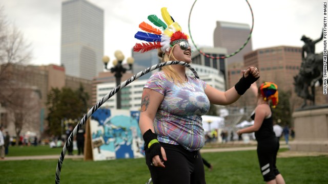 Sarah Rader of Colorado Springs hula-hoops in Civic Center Park in Denver on April 19. 