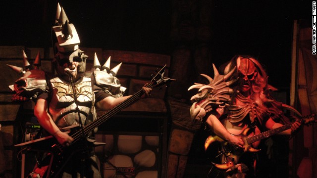 Bassist Jamison Land performs as Beefcake the Mighty, left, alongside lead guitarist Cory Smoot, or Flattus Maximus. While on tour in November 2011, Smoot died of a coronary artery thrombosis brought on by a heart condition, the coroner said. He was 34.