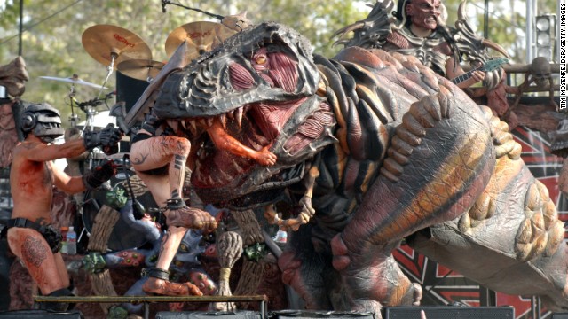 The band's resident dinosaur, Gor-Gor, wreaks havoc on stage.
