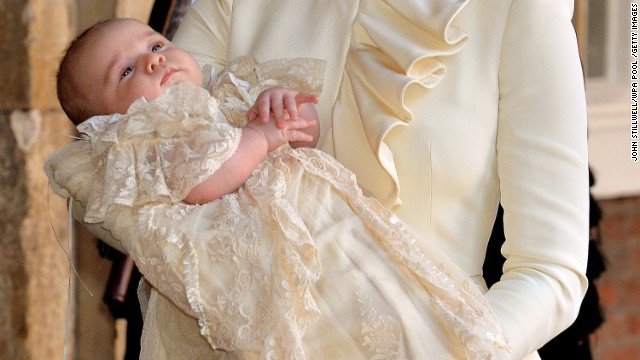 Catherine carries her son after his christening.