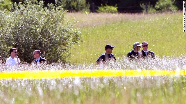 FBI agents search a field for Hoffa's remains on Monday, June 17, in Oakland Township, Michigan, outside Detroit. Alleged mobster Tony Zerilli tipped off the police, and a source close to the case said the information provided was "highly credible."