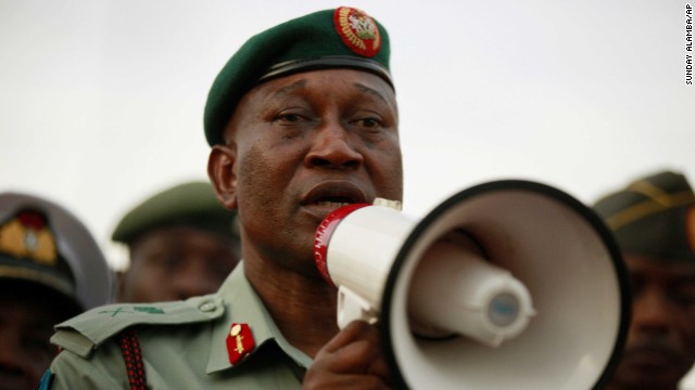 Brig. Gen. Chris Olukolade, Nigeria's top military spokesman, speaks to people at a demonstration May 6 in Abuja.