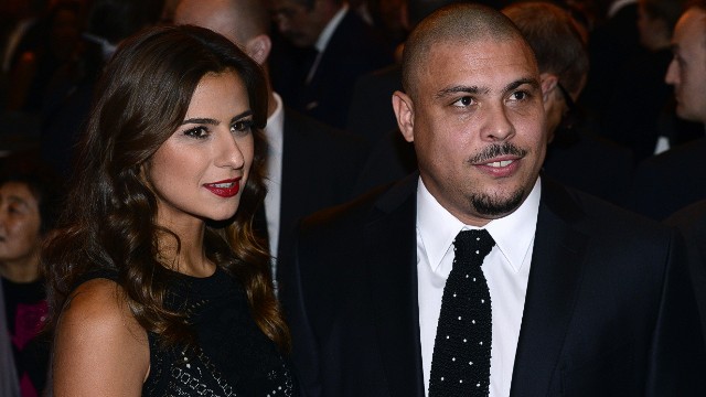 Another Brazilian -- three-time World Footballer of the Year -- Ronaldo was also in attendance, alongside girlfriend Paula Morais. The former forward now works on behalf of Brazil's 2014 World Cup committee. 