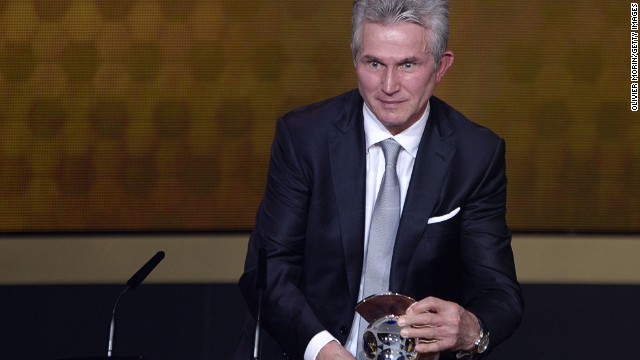 Now-retired Jupp Heynckes receives the Coach of the Year award after leading Bayern Munich to a Champions League, Bundesliga and German Cup treble in 2013. 
