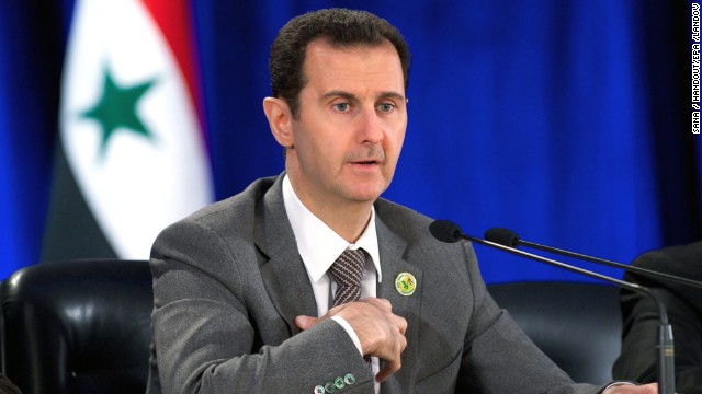 A handout photo released by SANA shows Syrian President Bashar al-Assad speaking March 8 during a meeting in Damascus, Syria, to mark the 51st anniversary of the 1963 revolution, when Baath Party supporters in the Syrian army seized power. Al-Assad said the country will go on with reconciliation efforts along with its fight against terrorism.