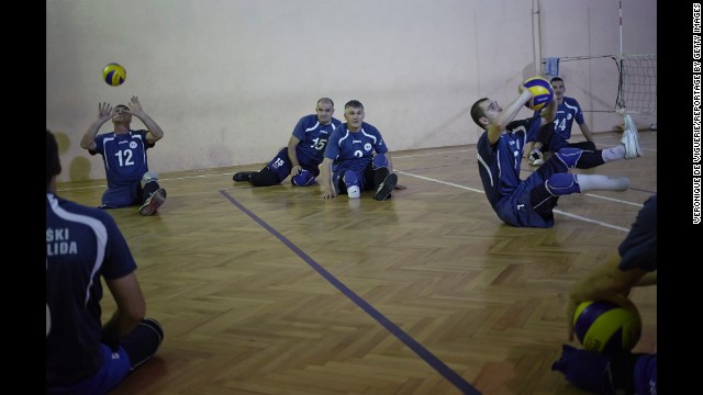 Land mine victims take part in a sitting volley ball match at the Doboj Gym Hall in Zenica, Bosnia.