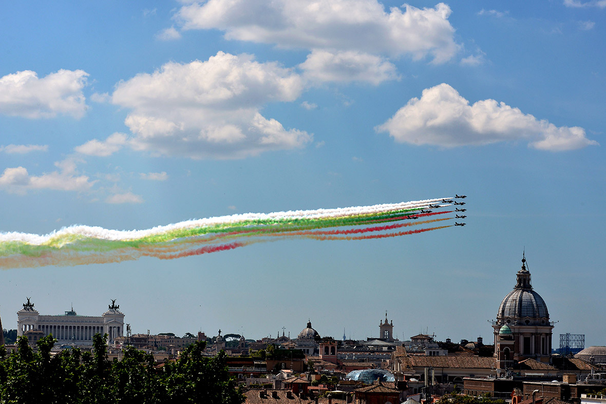 The Italian Air Force aerobatic unit Frecce Tricolori leaves smoke trails in the colours of the Italian flag over Rome as part of the ceremonies marking Republic Day