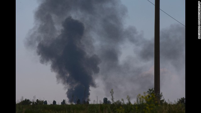 Smoke rises from a shot-down Ukrainian Army helicopter outside Slovyansk on May 29.