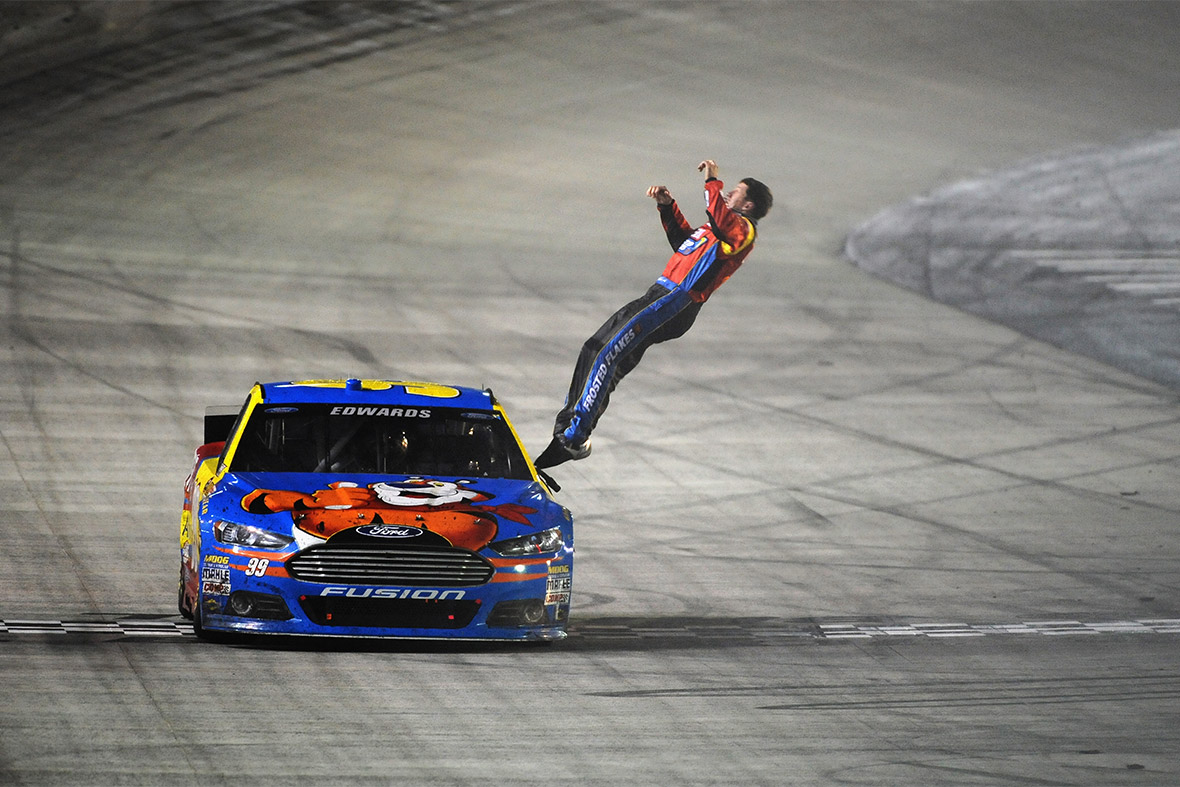 Carl Edwards celebrates with a backflip after winning the Nascar Sprint Cup Series Food City 500 in Bristol, Tennessee