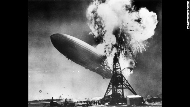 The Hindenburg zeppelin bursts into flames in Lakehurst, New Jersey, in May 1937.