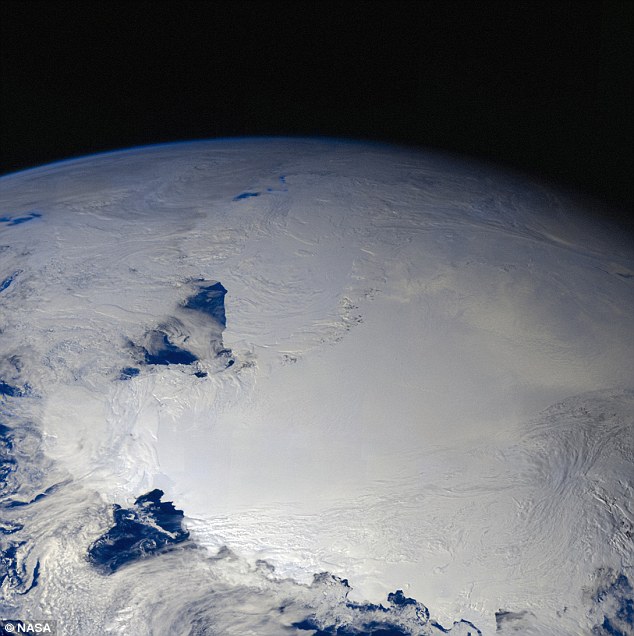 This image, taken by Nasa's Galileo space probe as it flew by Earth on its way to Jupiter in 1996, shows the Wilkes Basin (bottom right) as part of the Ross Ice Shelf. The basin stretches back more than 600 miles (1,000 km) inland and could dramatically raise sea levels if 'ice plugs' holding it back were to melt, says a study