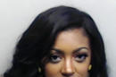 In this undated photo released by the Fulton County Sheriff’s Office, Porsha Williams poses for a mug shot in Atlanta. Williams of TV's "Real Housewives of Atlanta" faces a battery charge after fellow cast member Kenya Moore told police she was attacked during filming of the show. Atlanta police say they were called to the Biltmore Hotel on March 27, where Moore told an officer Williams assaulted her. Police say Moore told the officer she was. (AP Photo/ Fulton County Sheriff’s Office)