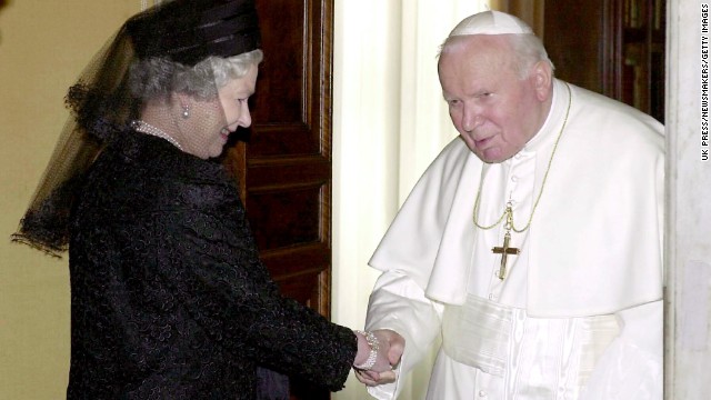 The Queen shakes hands with Pope John Paul II at the Pope's private office in October 2000.