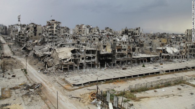 Buildings lie in ruins in Homs on Saturday, May 10, days after an evacuation truce went into effect. Thousands of displaced residents have returned to the city.