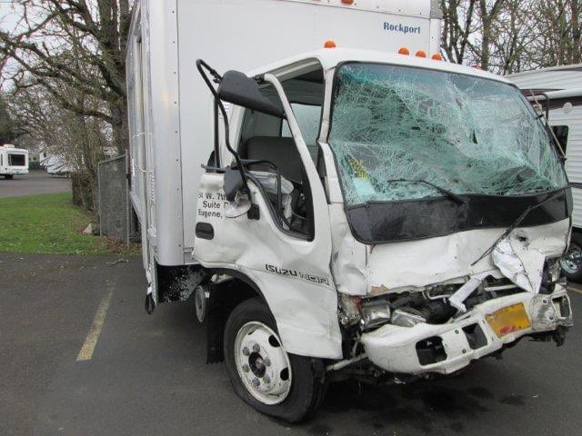 Client's Isuzu work truck from accident in Eugene, OR