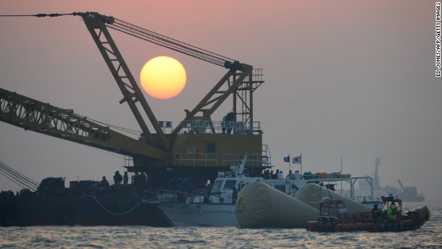 The sun sets over the site of the sunken ferry off the coast of the South Korean island of Jindo on April 22.