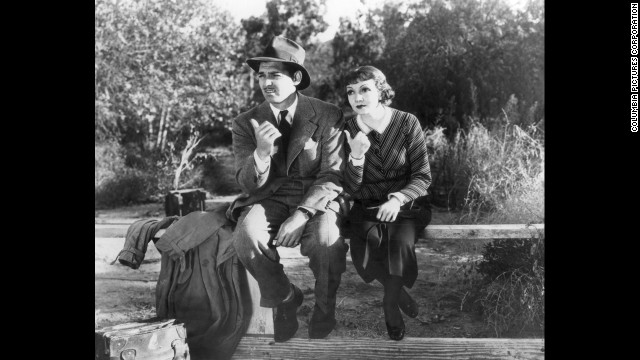 Clark Gable and Claudette Colbert star in "It Happened One Night," which in 1935 wins all five major Academy Awards: best picture, best director, best actor, best actress and best screenplay.
