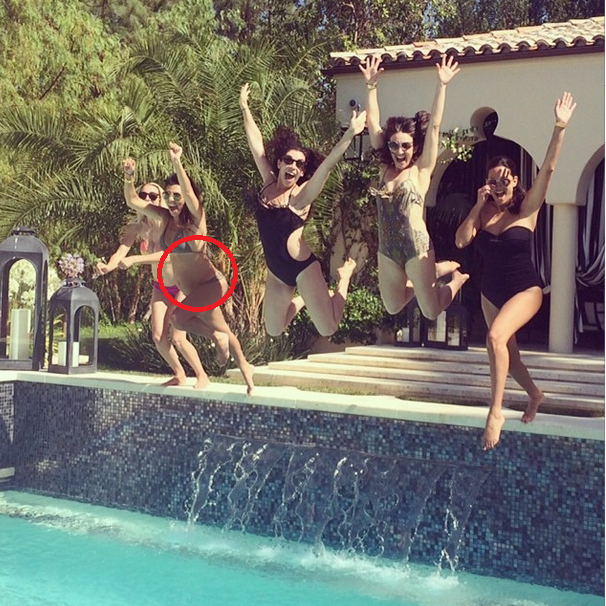 Pregnant Kourtney Kardashian Shows Off Baby Bump While She Jumps Into Pool 1