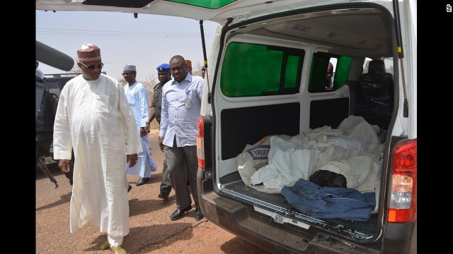 Ibrahim Gaidam, governor of Yobe state, left, looks at the bodies of students inside an ambulance outside a mosque in Damaturu. At least 29 students died in an attack on a federal college in Buni Yadi, near the the capital of Yobe state, Nigeria's military said on February 26. Authorities suspect Boko Haram carried out the assault in which several buildings were also torched. In April as many as 200 girls were abducted from their boarding school in northeastern Nigeria by heavily armed Boko Haram Islamists who arrived in trucks, vans and buses, officials and witnesses said. The group has recently stepped up attacks in the region, and its leader released a video last month threatening to kidnap girls from schools.