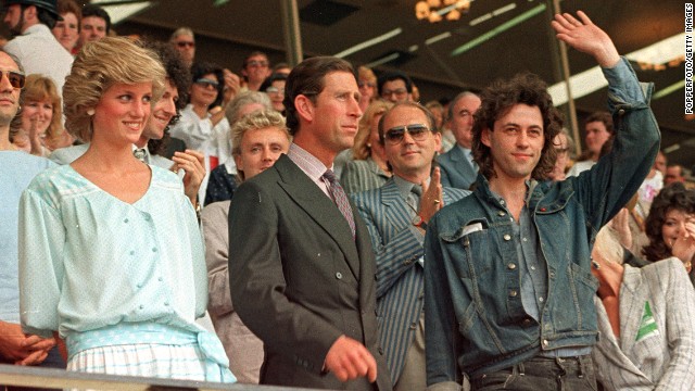 The Prince and Princess of Wales are pictured with Bob Geldof at the "Feed the World" Live Aid concert at Wembley Stadium in 1985. 