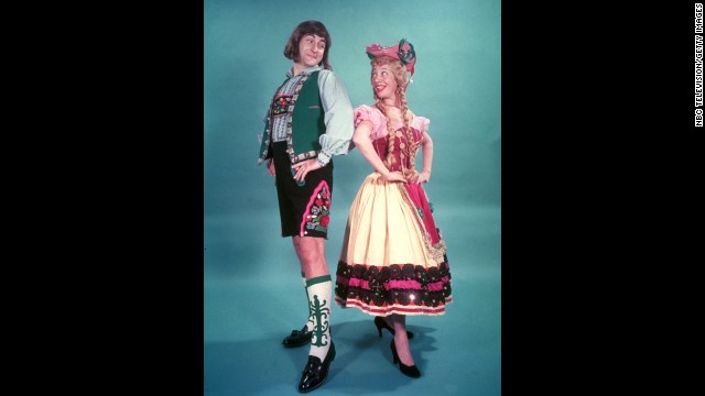 Caesar and Imogene Coca wear Bavarian costumes during a promotional photo shoot for the 1950s television program "Your Show of Shows."