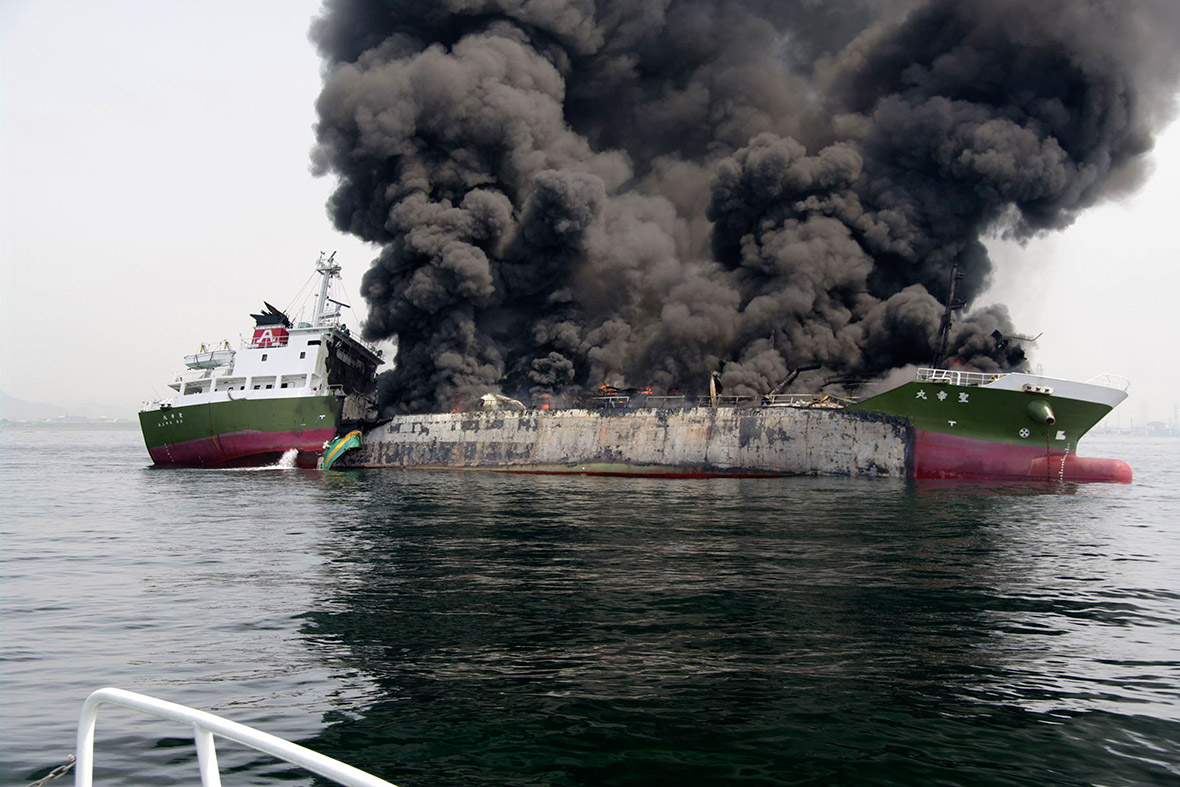 Smoke rises from the 998-tonne fuel tanker Shoko Maru after it exploded off the coast of Himeji, western Japan