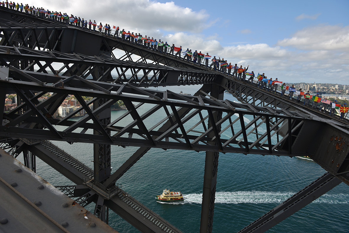 Hundreds of people carrying flags climb Sydney Harbour Bridge in an attempt to break the World Record for the most people on the bridge at one time and also the most flags on the bridge at one time. A new record of 340 was set, beating the previous record of 316 organised by Oprah Winfrey in 2008. A new record for the number of different international flags flown was also set, with 219, beating the previous record of 143