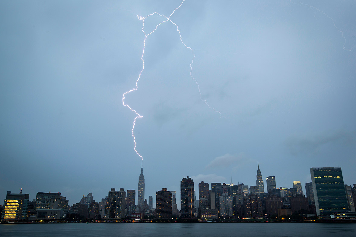 A bolt of lightning strikes the Empire State Building during a summer thunderstorm in New York.