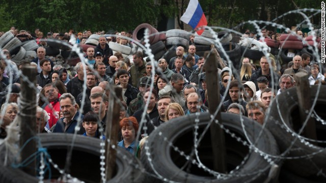 Pro-Russian protesters gather in Donetsk to honor the memory of comrades who died in Odessa.