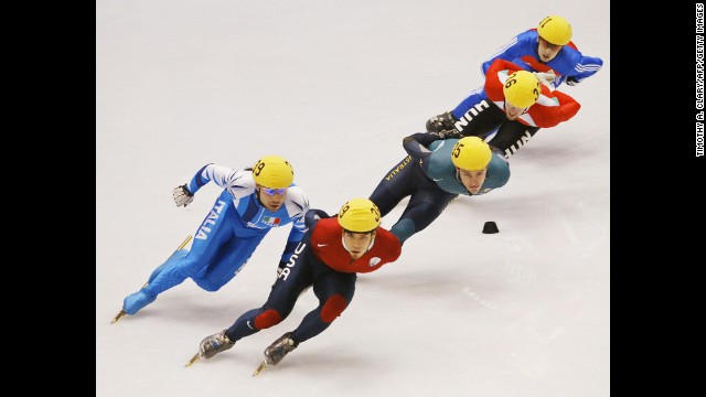From left, Italian Fabio Carta, American Apolo Anton Ohno, Australian Mark McNee, Hungarian Kornel Szanto and Britain's Nicky Gooch skate during the men's 1,500-meter short-track heats in Salt Lake City in 2002.