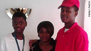Dinyal New with her two sons, Lee, pictured on the left, and Lamar.