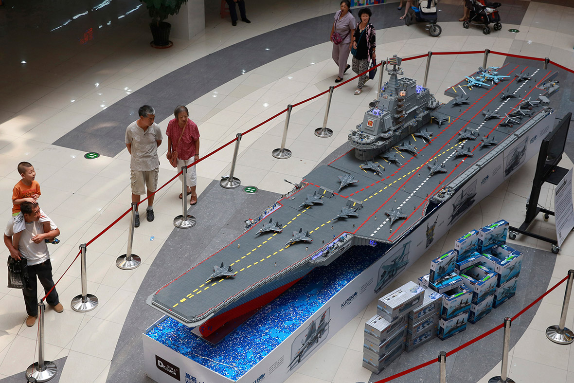 People look at a replica of Chinese aircraft carrier 