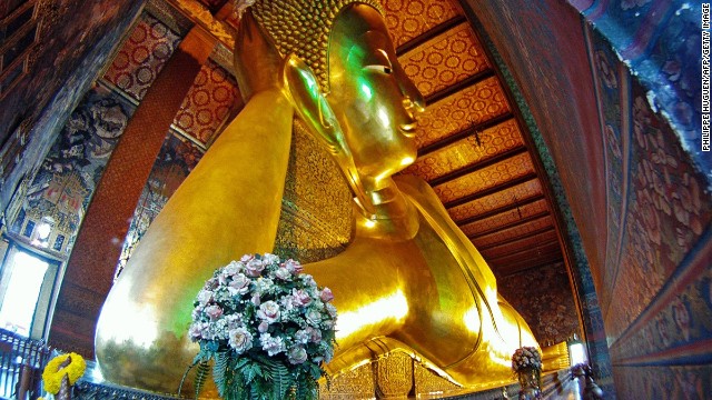 Bangkok's Wat Pho temple complex is home to Thailand's biggest reclining Buddha. The statue is 15 meters high and 43 meters long.