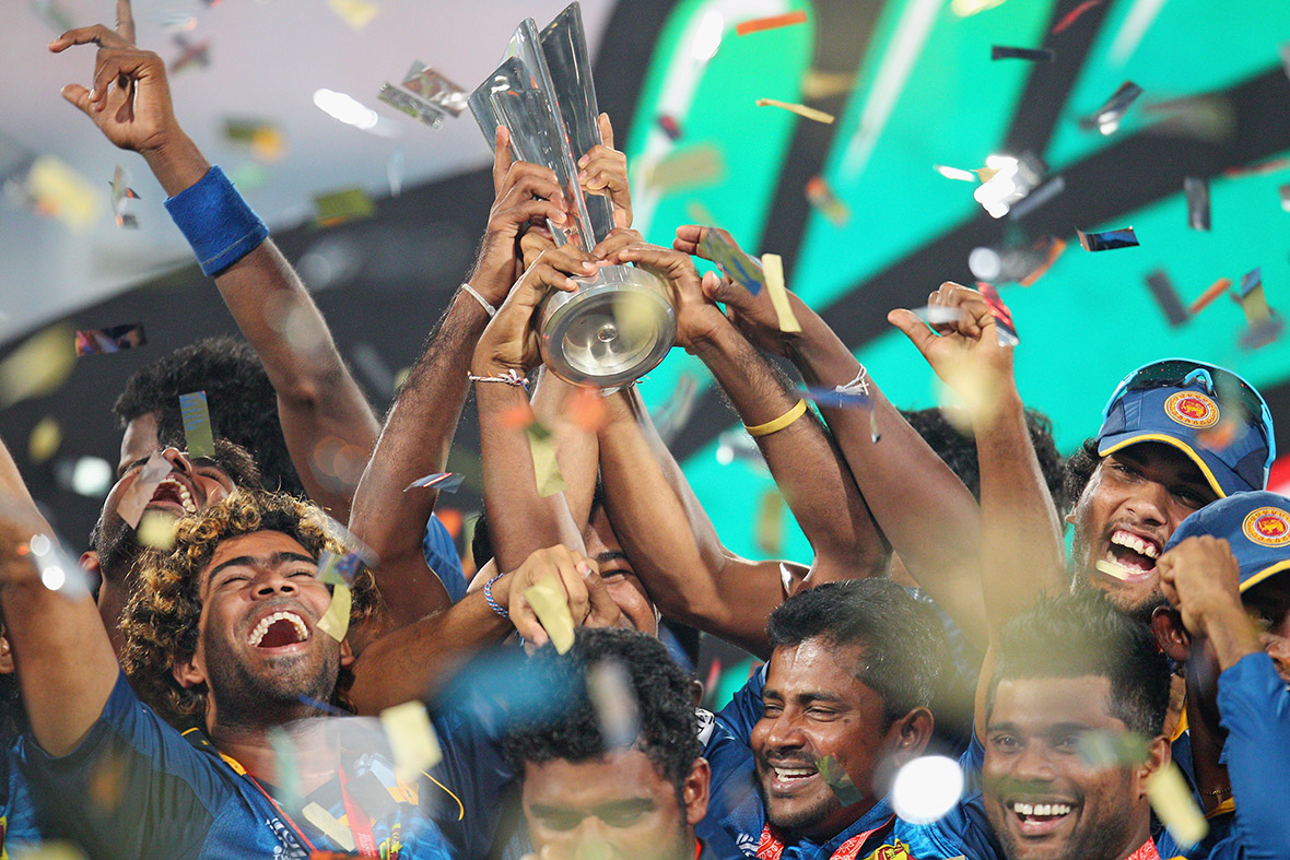 Lasith Malinga of Sri Lanka and his team celebrate with the trophy after beating India in the final of the ICC World Twenty20 in Dhaka, Bangladesh