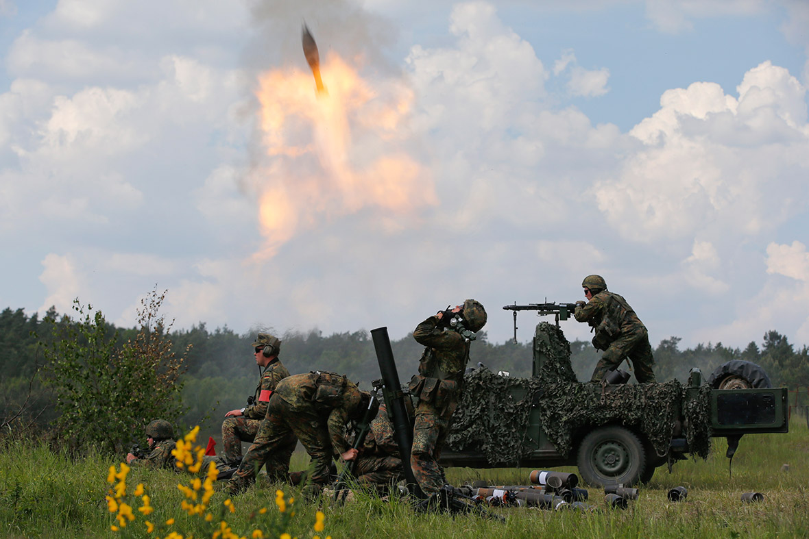 German soldiers fire mortars during an exercise at an army training area in Bergen