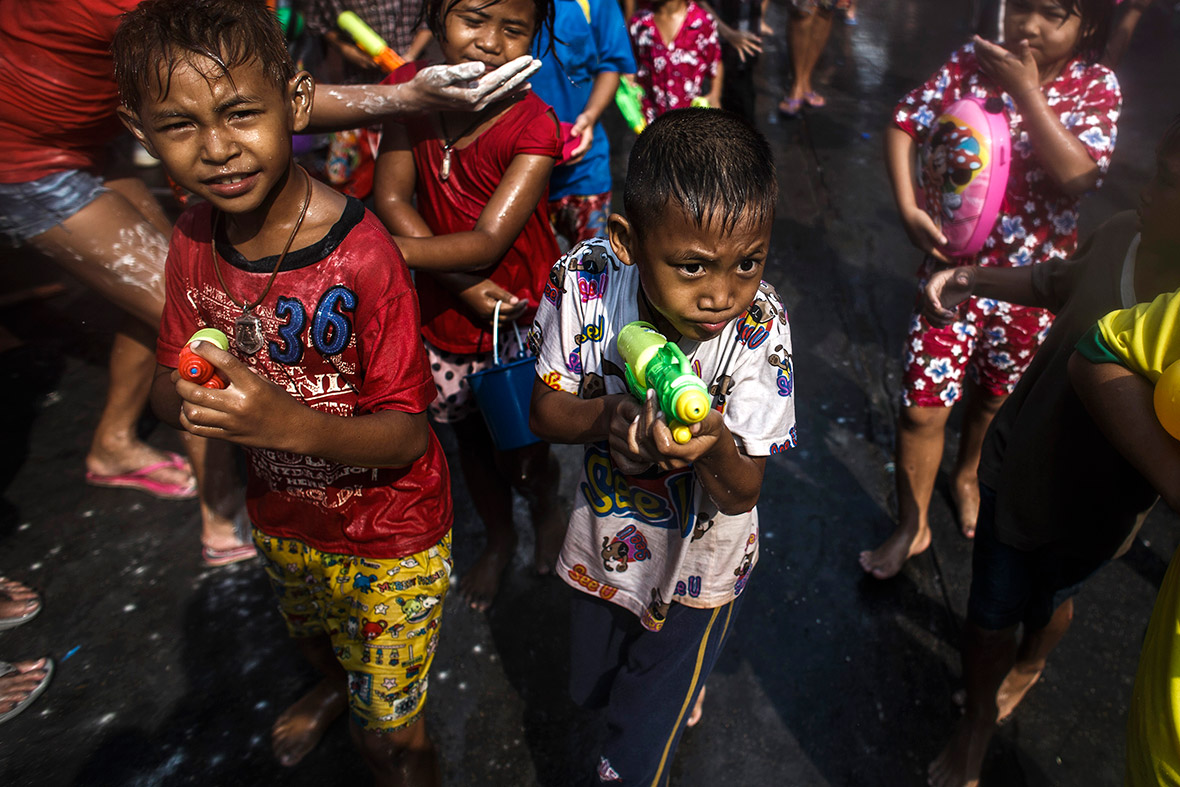 Children prepare to drench tourists on Bangkok's Khaosan Road