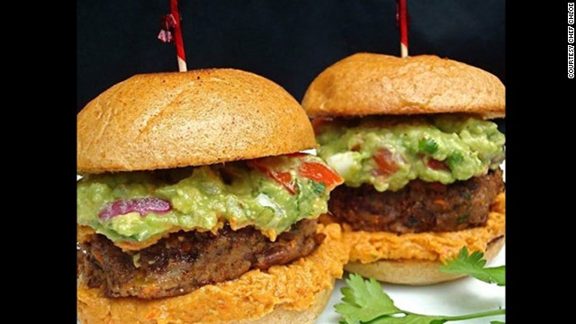 Caramelized onions are folded into black bean patties, then topped with homemade guacamole for these vegan-friendly Mexicali sliders.