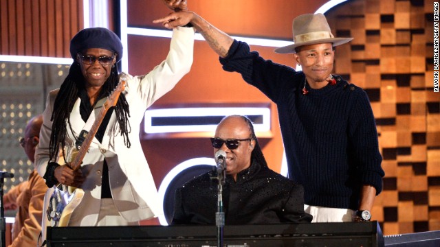 Then again, maybe Pharrell's passion for what he does helps him look so refreshed. He was clearly thrilled to take the stage with Nile Rodgers, left, and Stevie Wonder at the 2014 Grammys. 