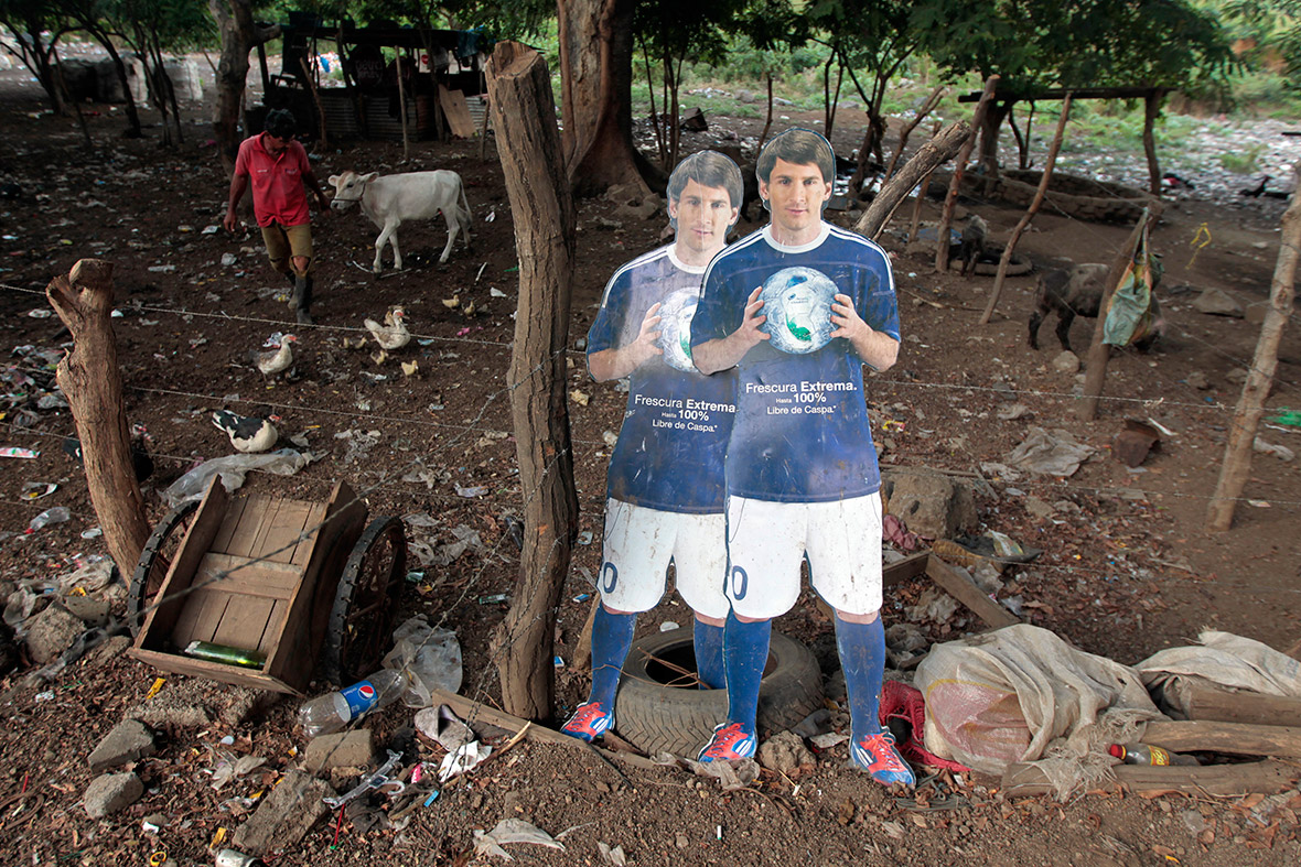 Cardboard cut outs of Argentinian player Lionel Messi are seen at a rubbish recycling centre in Managua, Nicaragua