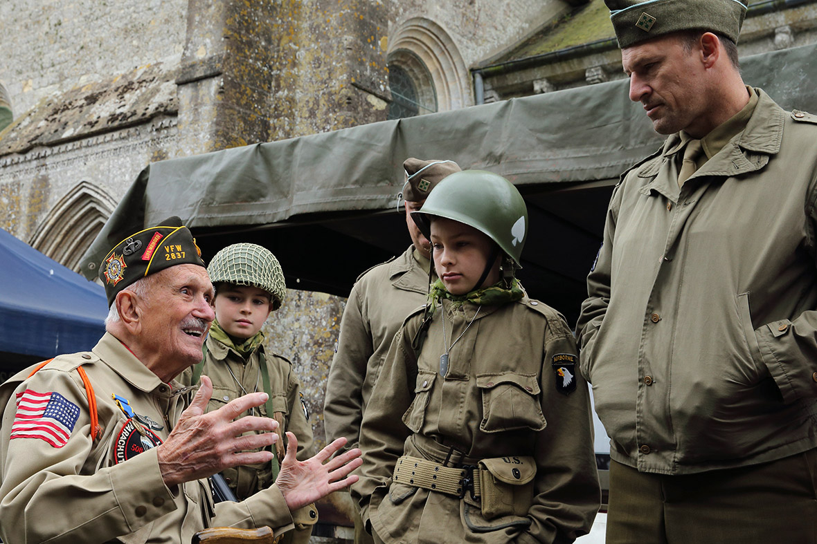 US World War II veteran Jack W Schlegel, 91, who served with the 508 PIR, 82nd Airborne, speaks to history enthusiasts in Sainte-Marie-du- Mont, France. Schlegel parachuted onto the Normandy coast in the early hours of June 6, 1944
