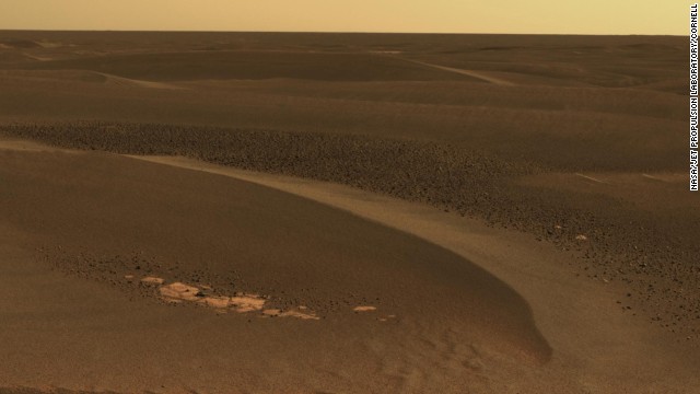 The Opportunity rover has studied windblown ripples in an area called the Meridiani Planum. This image, taken on April 27, 2006, shows a field of rocks known as cobbles among ripples about 8 inches high. The windblown ripples are likely left from a time when wind patterns were different,<strong> </strong>said planetary scientist Ray Arvidson.