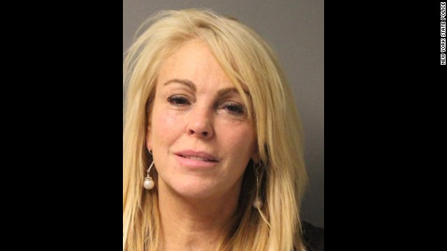 Dina Lohan's police booking photo following her arrest in New York on September 12, 2013 on DWI charges.