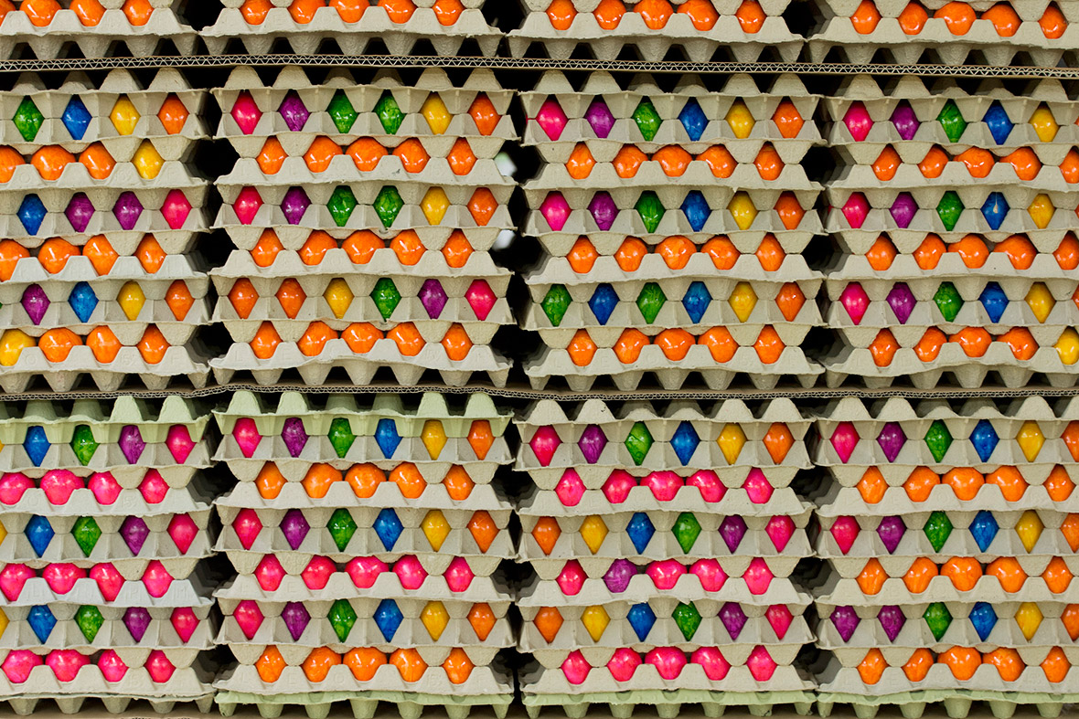 Freshly-painted hens' eggs are stacked in cartons at Baumeister Frischei poultry farm in Breckerfeld, Germany