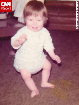 "Are my legs made of rubber?" -- Krisi Hernandez, age 11 months, takes her very first step before falling down. 