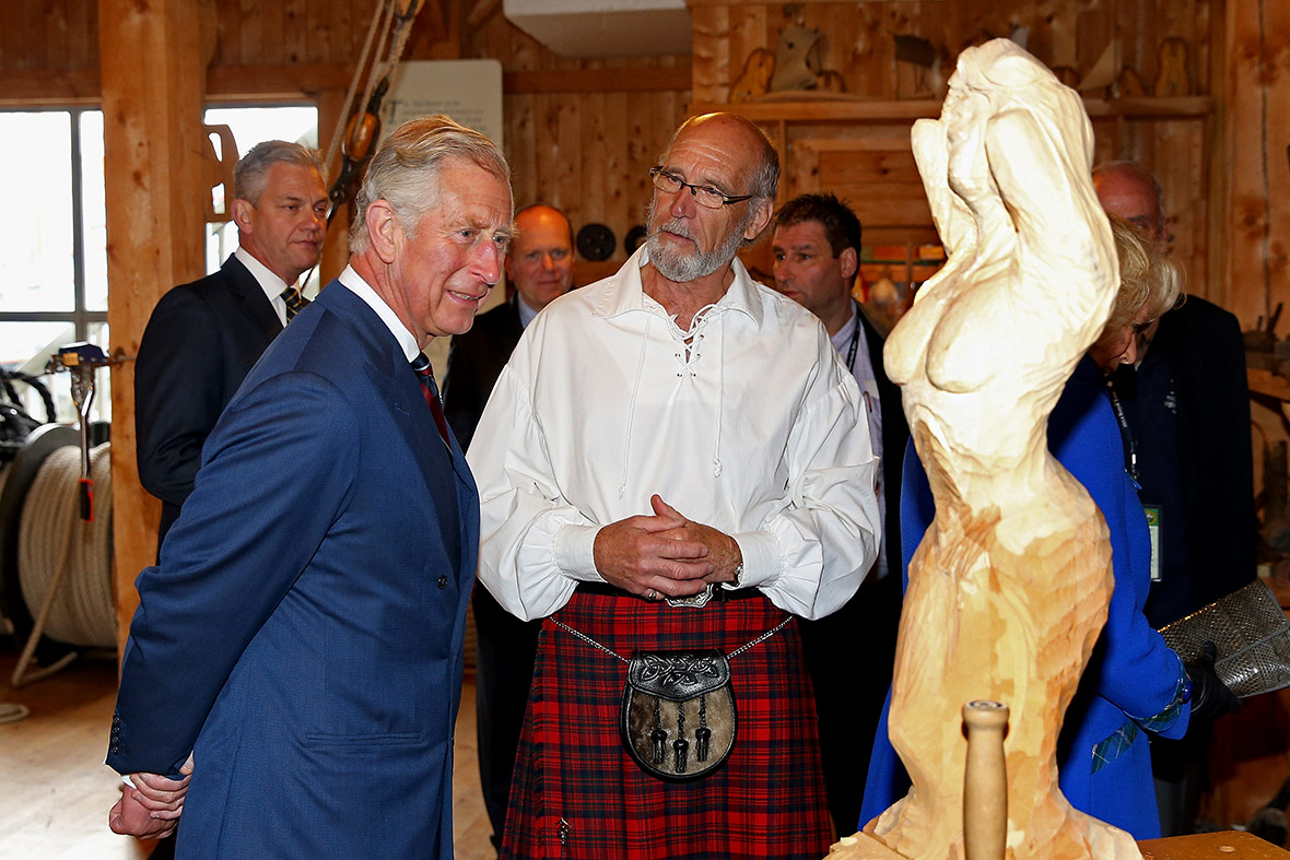 Prince Charles looks at a sculpture at Pier 21 in Halifax, Nova Scotia. The Prince of Wales and Duchess of Cornwall are on a four-day visit to Canada