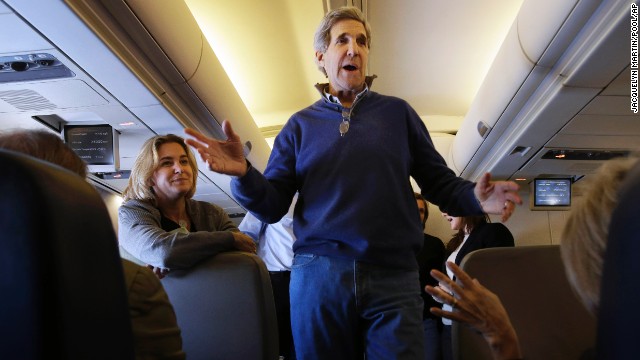 John Kerry talks to reporters en route to London on his first trip as secretary of state in February 2013. The trip took him through European and Middle Eastern capitals. 